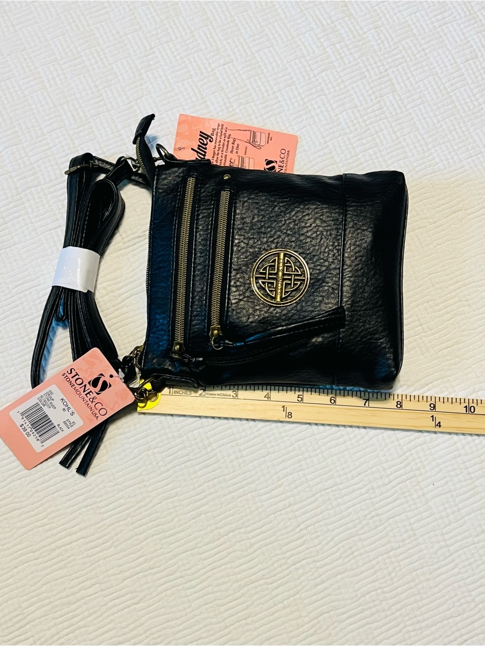 Stone & Co. Black Crossbody Bag with Gold Emblem